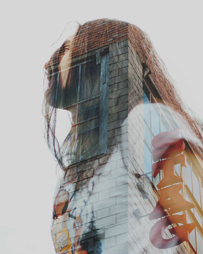 Image of a translucent person with a building being shown through them